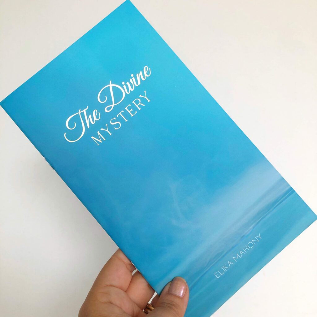 The Divine Mystery booklet-album